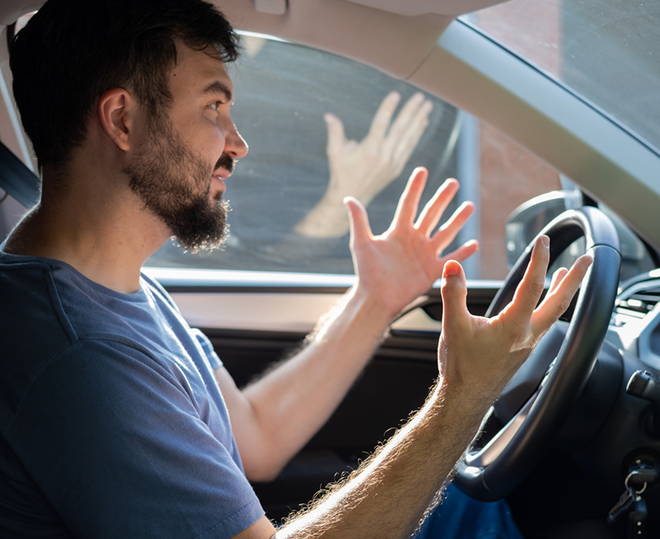 man inside a car